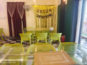 Party setup with decorated tables and ambient lighting